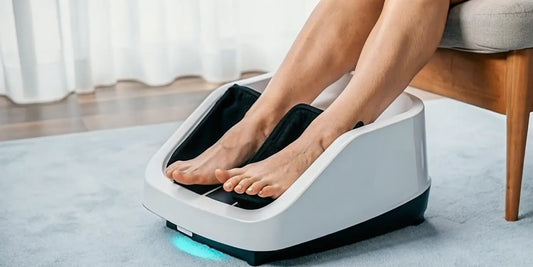 A person using an Achilles massager machine on their foot and ankle.